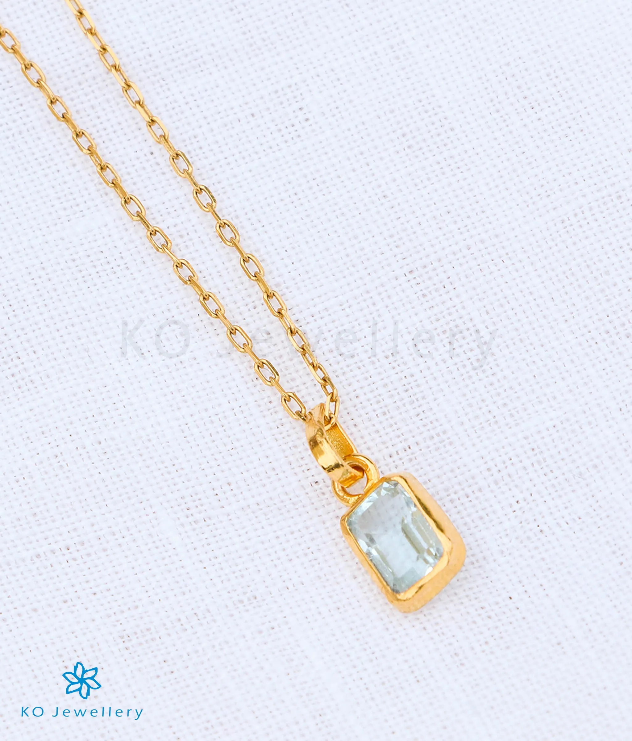 Bright Blue Topaz Pendant & Earstuds in 22 KT Gold