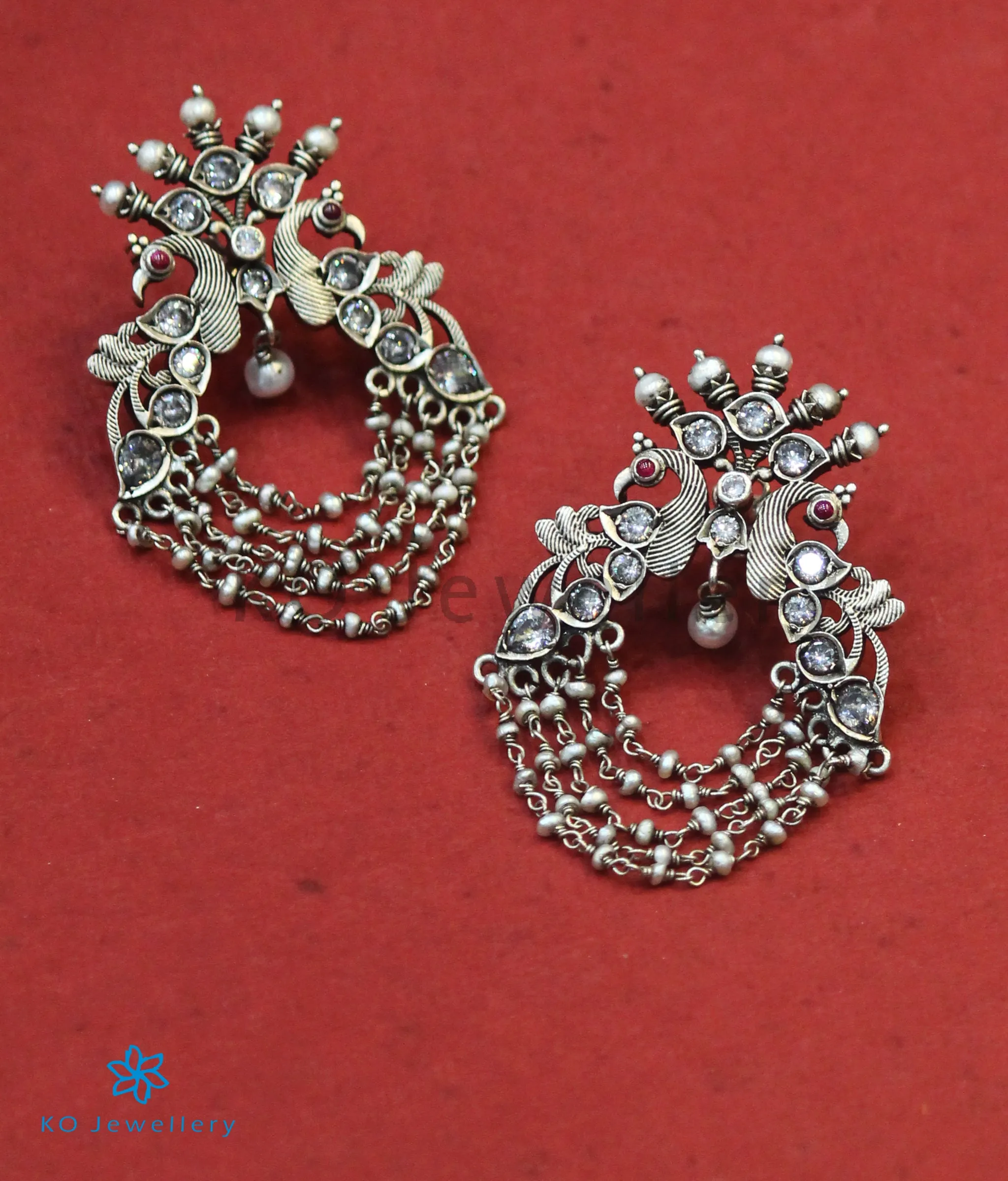 The Drishya Silver Peacock Earrings (Red/White;Oxidised)