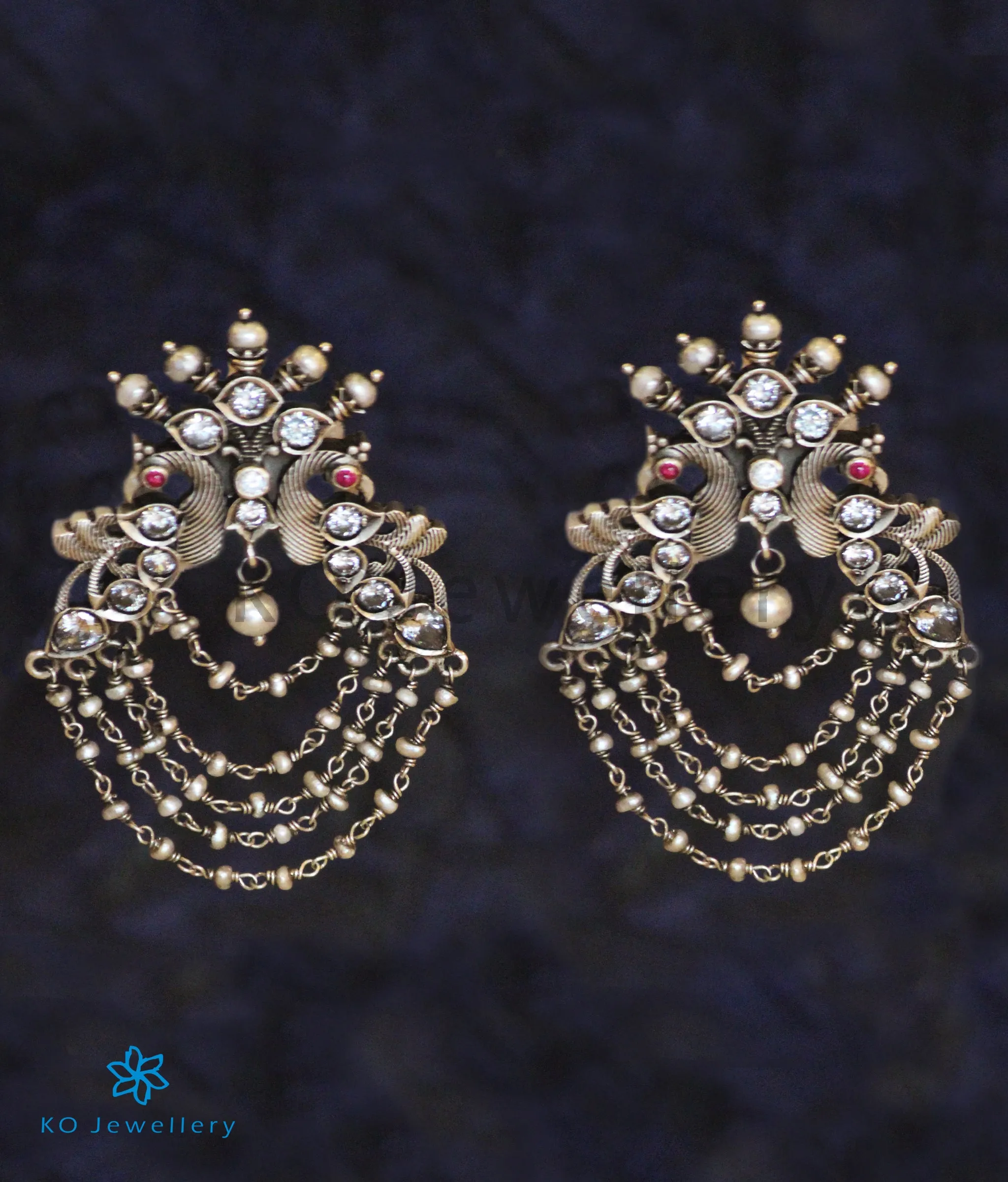 The Drishya Silver Peacock Earrings (Red/White;Oxidised)