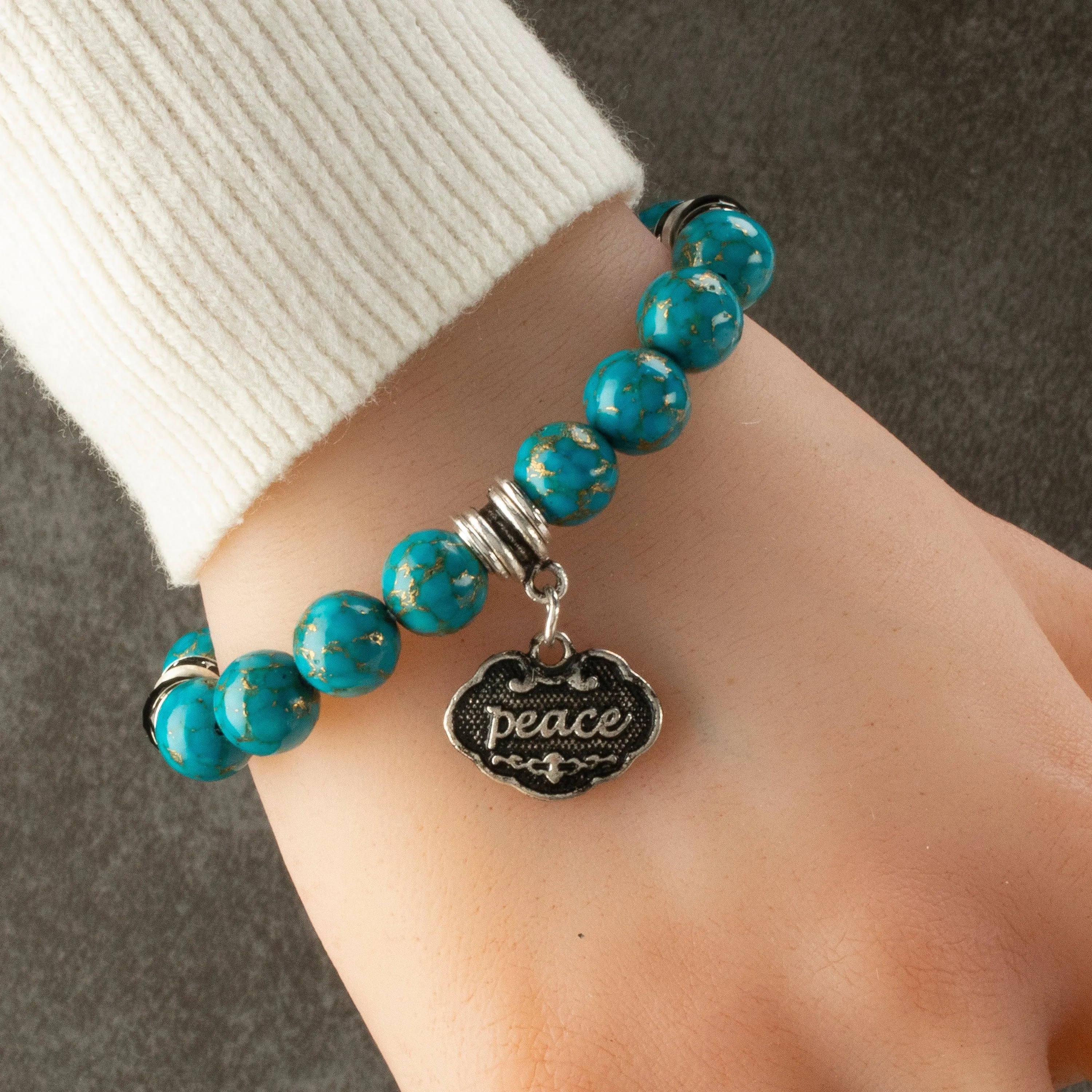 Turquoise 10mm Gemstone Elastic Bead Bracelet with Peace & Black Agate Accent Beads